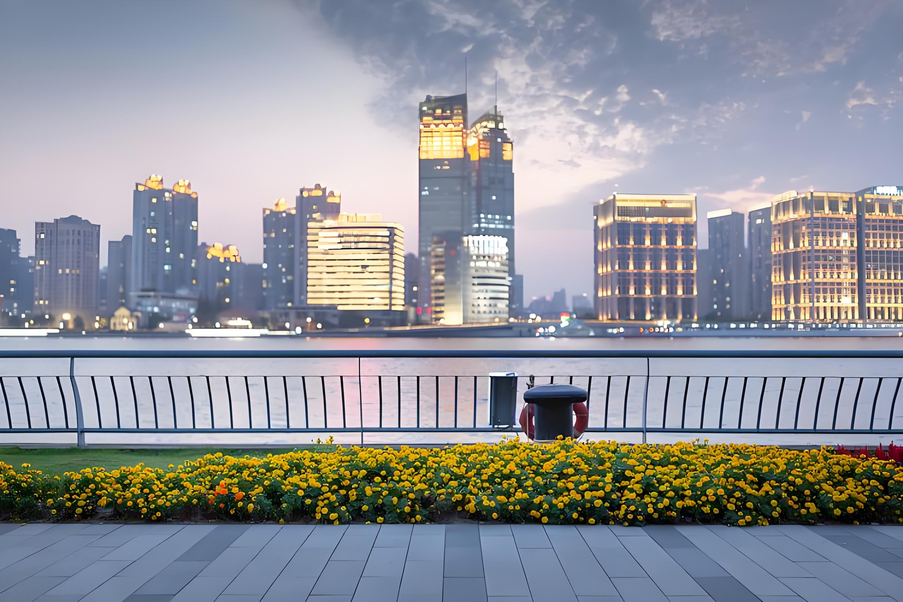 Photo of the riverside greenway with bridges and the skyline beyond